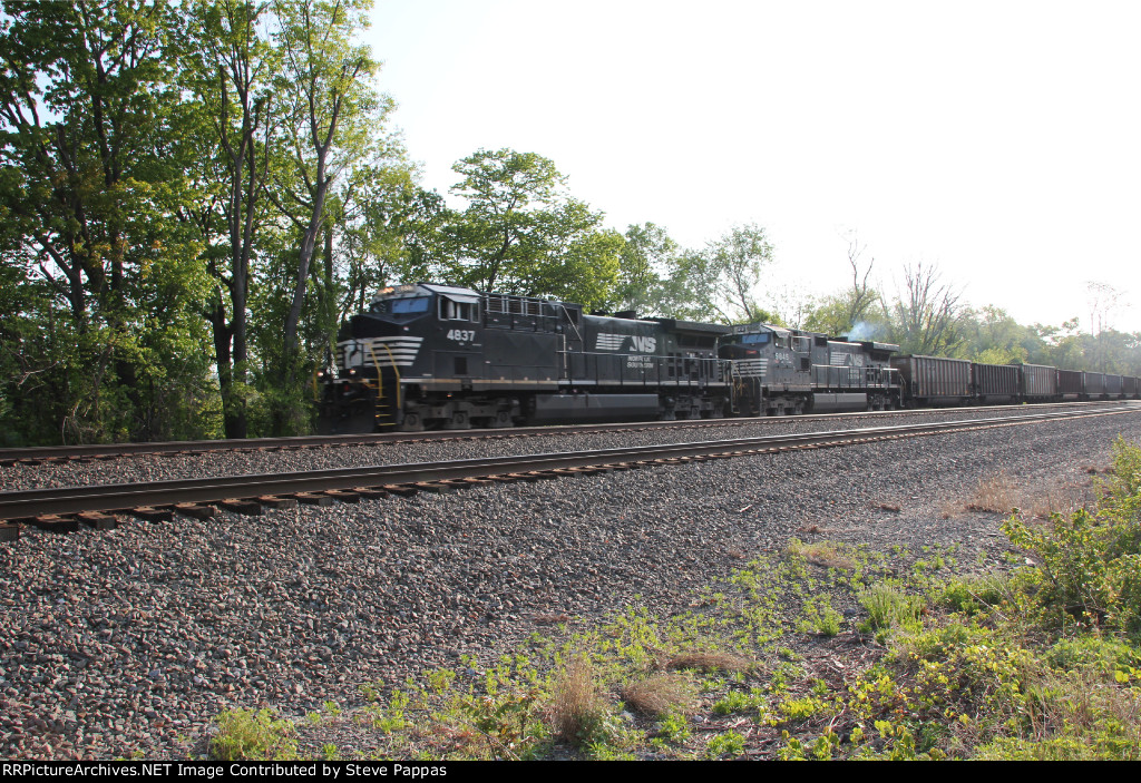 NS 4837 leads train 595 west with 192 coal empties